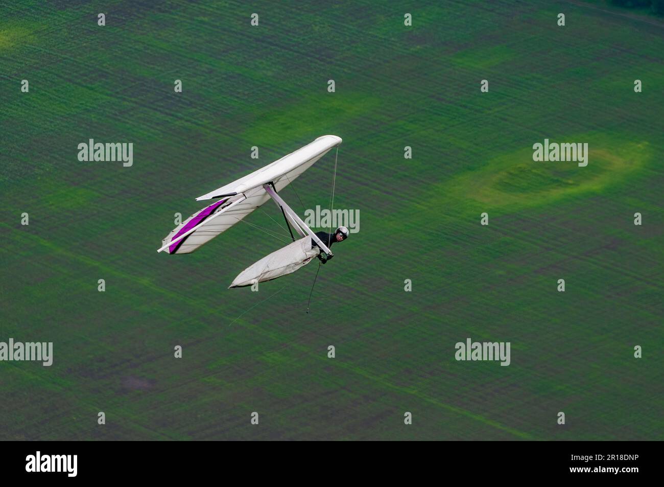 Hangglider wing in flight. Aerial photo Stock Photo