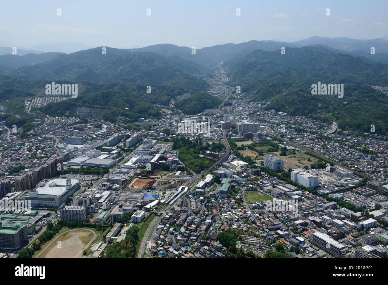 Hazama station aerial shot view from the East side towards the mt.takao Stock Photo