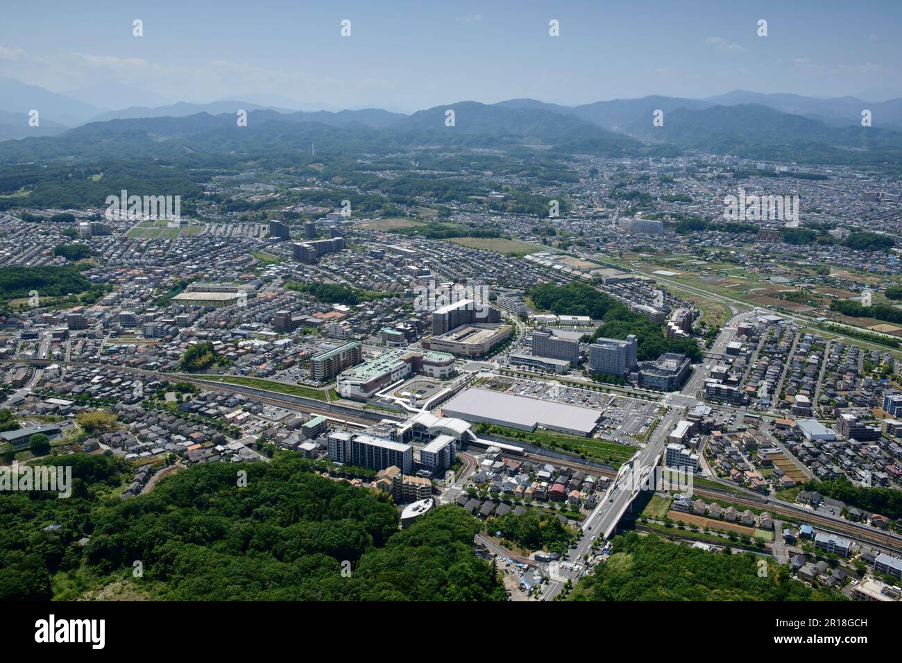 Hachioji Minami-Nagano station aerial shot view from the east side towards mt.takao direction Stock Photo