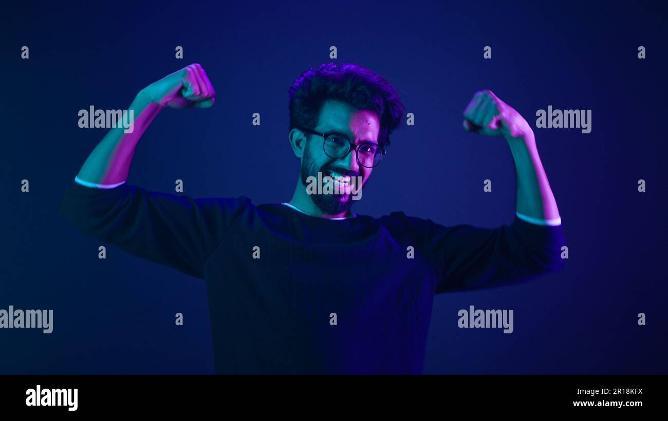 Funny Indian Man Slim Guy Fooling Around Show Hands Muscle Biceps Sport funny-indian-man-slim-guy-fooling-around-show-hands-muscle-biceps-sport