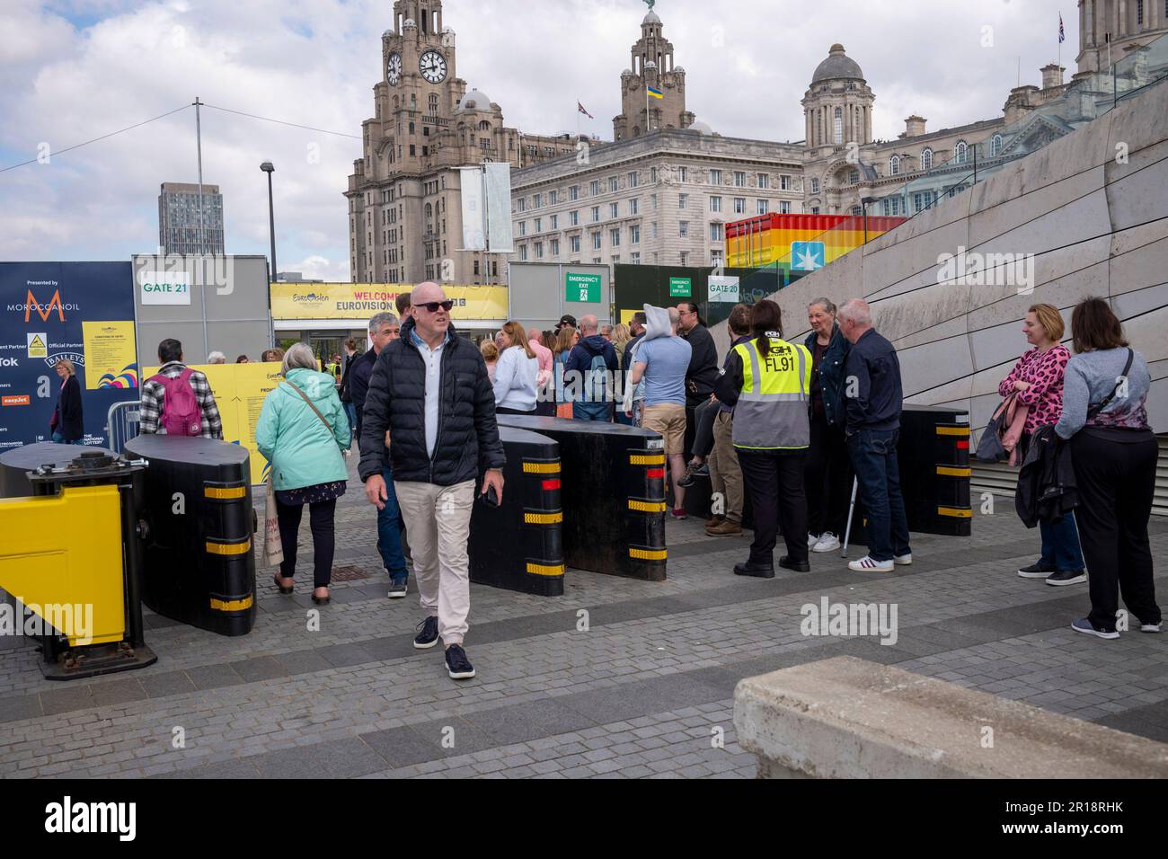 Liverpool Uk 12th May 2023. Eurovision Song Contest 2023. Last day before the final, people flock/queue to enter the Eurovision Village at the Pier Head to watch rehearsals on the big screen. Credit: Rena Pearl/Alamy Live News Stock Photo