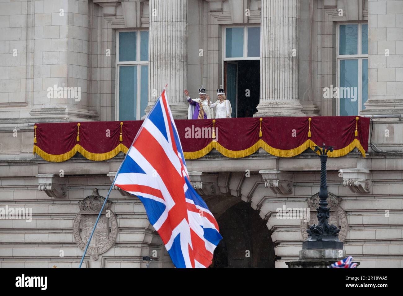 6th May 2023 - King Charles and Queen consort Camilla appear on the balcony of Buckingham Palace after his Coronation in London Stock Photo