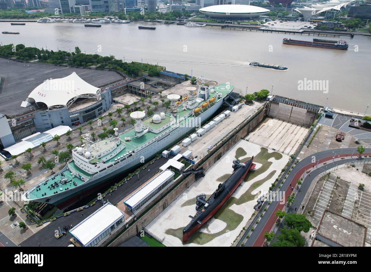 SHANGHAI, CHINA - MAY 10, 2023 - The Yuanwang-1 survey ship is seen in Dock 2 at the original site of Shanghai Jiangnan Shipyard in Shanghai, China, May 10, 2023. Yuanwang-1 is the first generation integrated space oceangoing survey ship designed and built by China. Yuanwang-1 made 44 ocean expeditions in 32 years from 1978 to 2010, safely sailed for more than 2,600 days and 440,000 nautical miles, and successfully completed 57 major national scientific research and test missions, including intercontinental missiles, submarine-launched missiles, various domestic and foreign satellites and mann Stock Photo