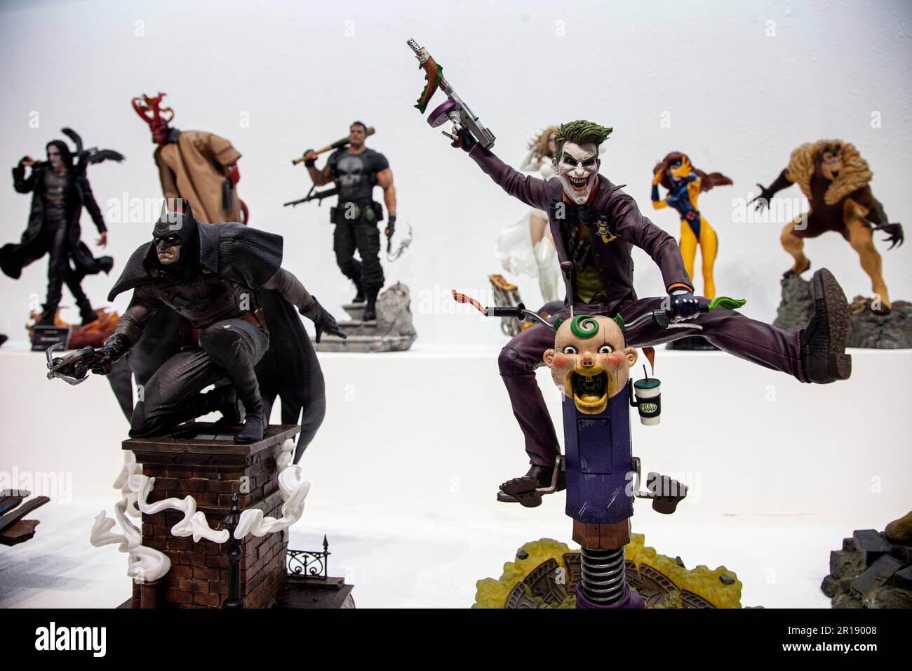 The superhero statues are seen displayed on the opening day of the