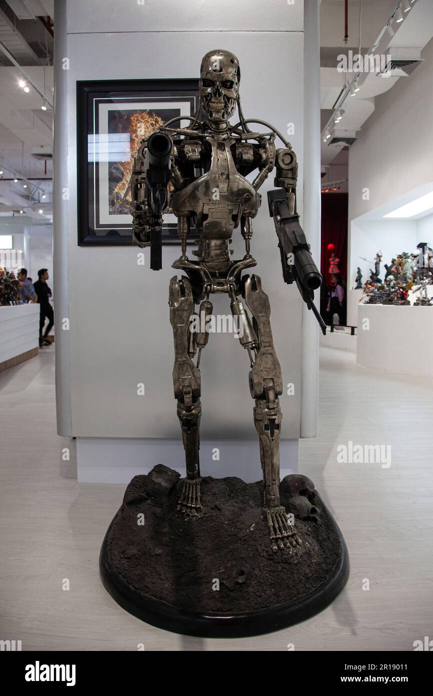 The superhero statues are seen displayed on the opening day of the