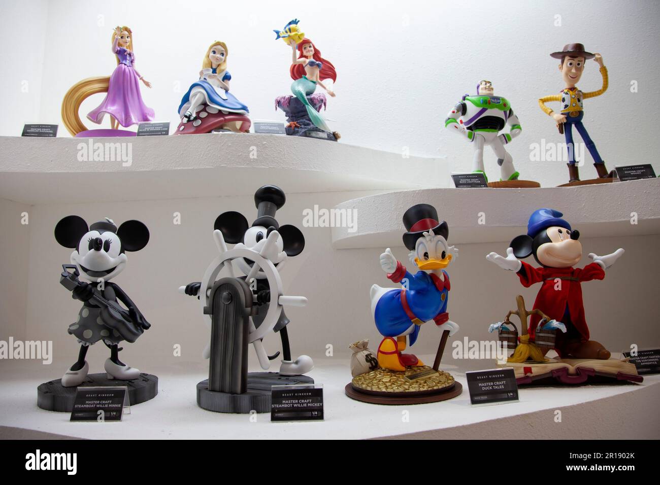 The superhero statues are seen displayed on the opening day of the