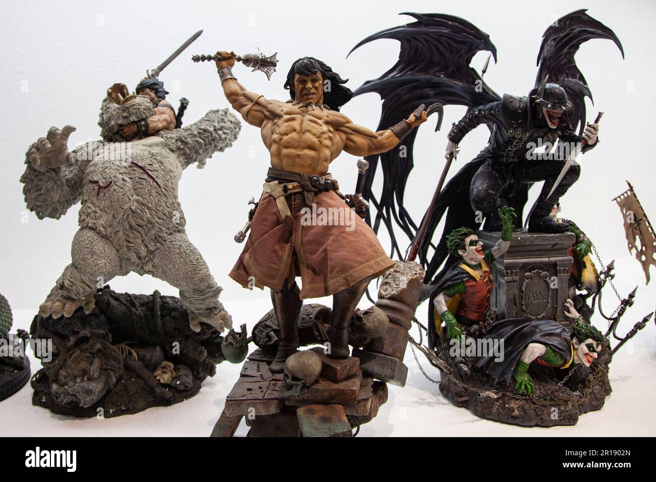 The superhero statues are seen displayed on the opening day of the