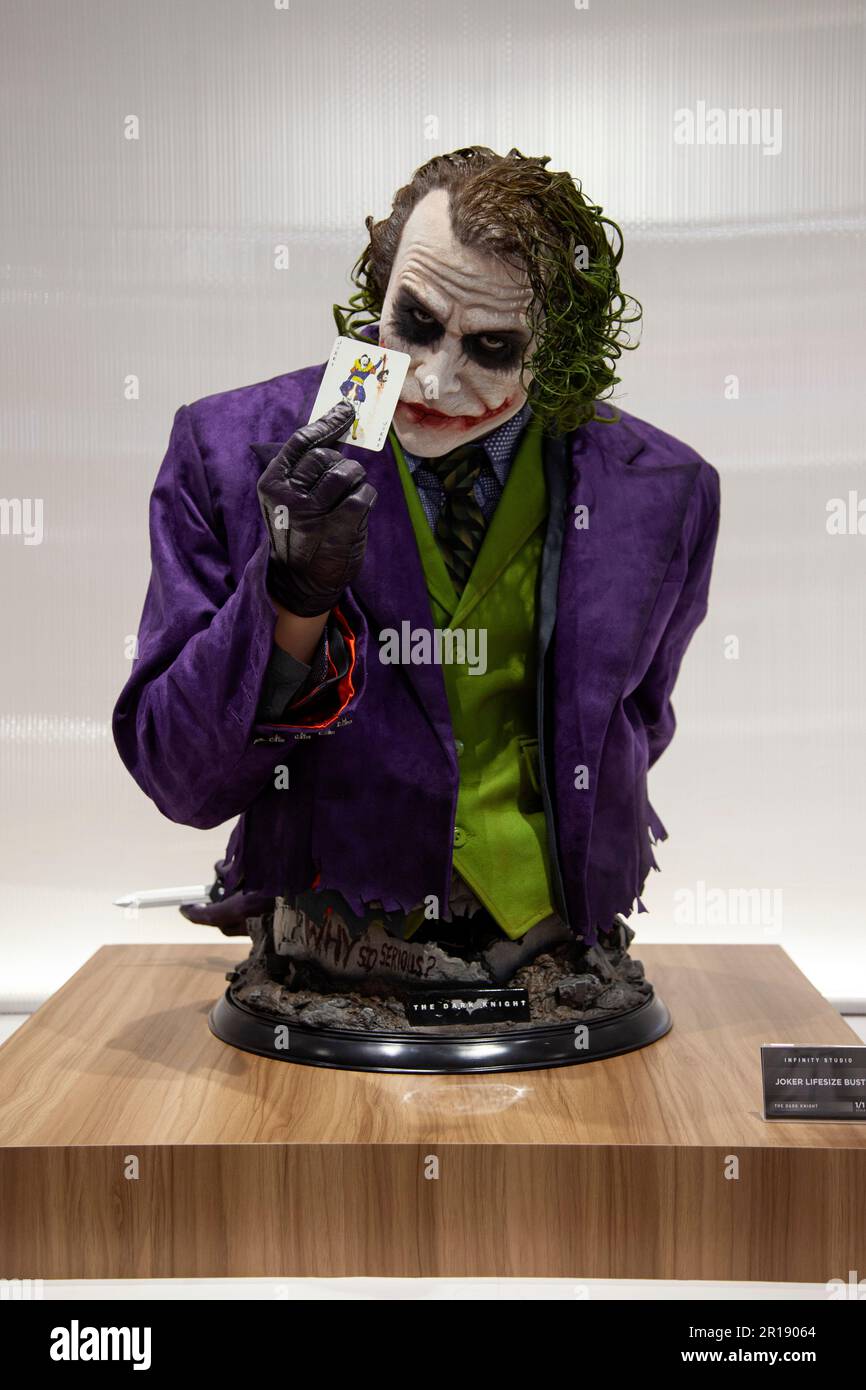 The superhero statues are seen displayed on the opening day of the