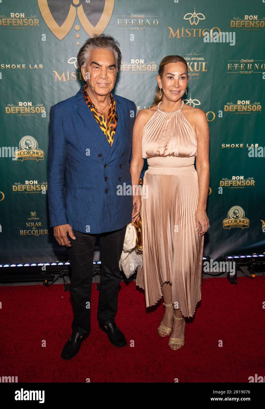 CORAL GABLES, FL-MAY 11: Jose Luis Rodriguez “El Puma” and Carolina Perez are seen during the opening of Gilberto Santa Rosa and Silvester Dangon restaurant “Mistico” on May 11, 2023 in Coral Gables, Florida.s (Photo by Alberto E. Tamargo/Sipa USA) Stock Photo