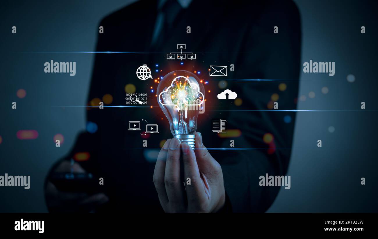Hand holding Light bulb global Internet connection. Innovation cloud computing digital technology marketing, information management, big data. Stock Photo