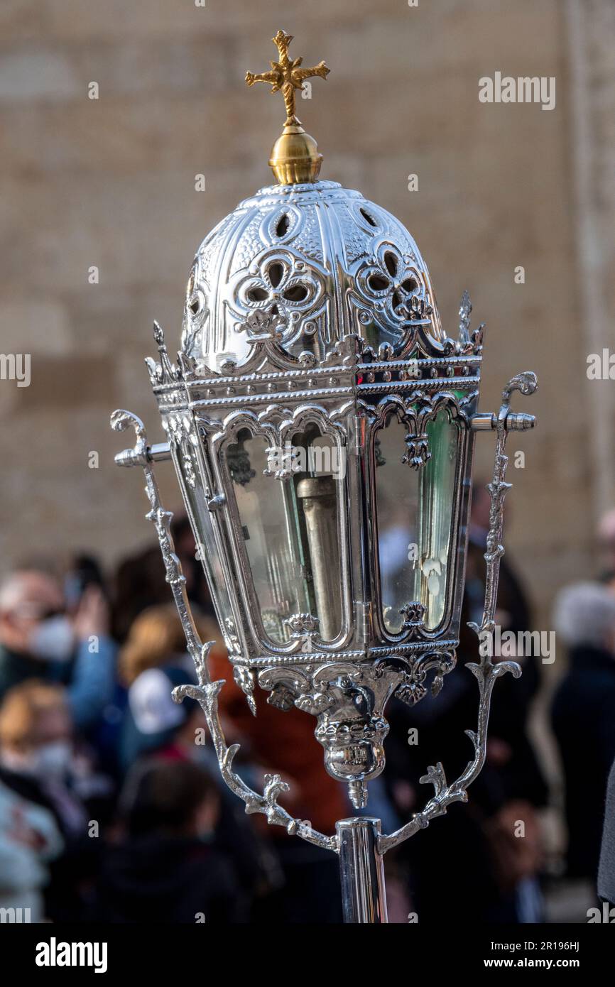 A candle holder of the Brotherhood of Jesus in the Sacrament and Holy Mary of Mercy, Amparo de los Leoneses during Semana Santa, Leon, Spain Stock Photo