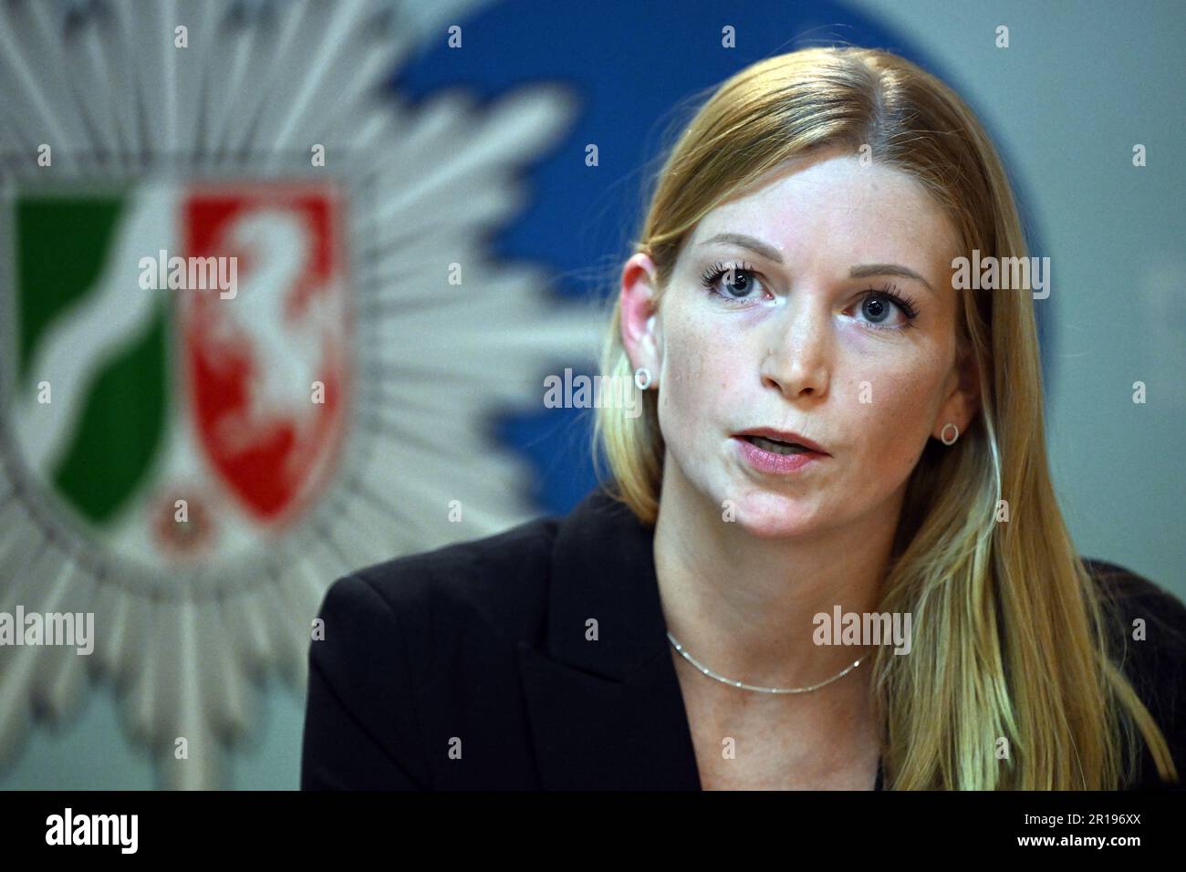 Duesseldorf, Germany. 12th May, 2023. Laura Neumann, Düsseldorf public  prosecutor, sits at the table during a press conference. One day after the  serious explosion with five critically injured people in a high-rise