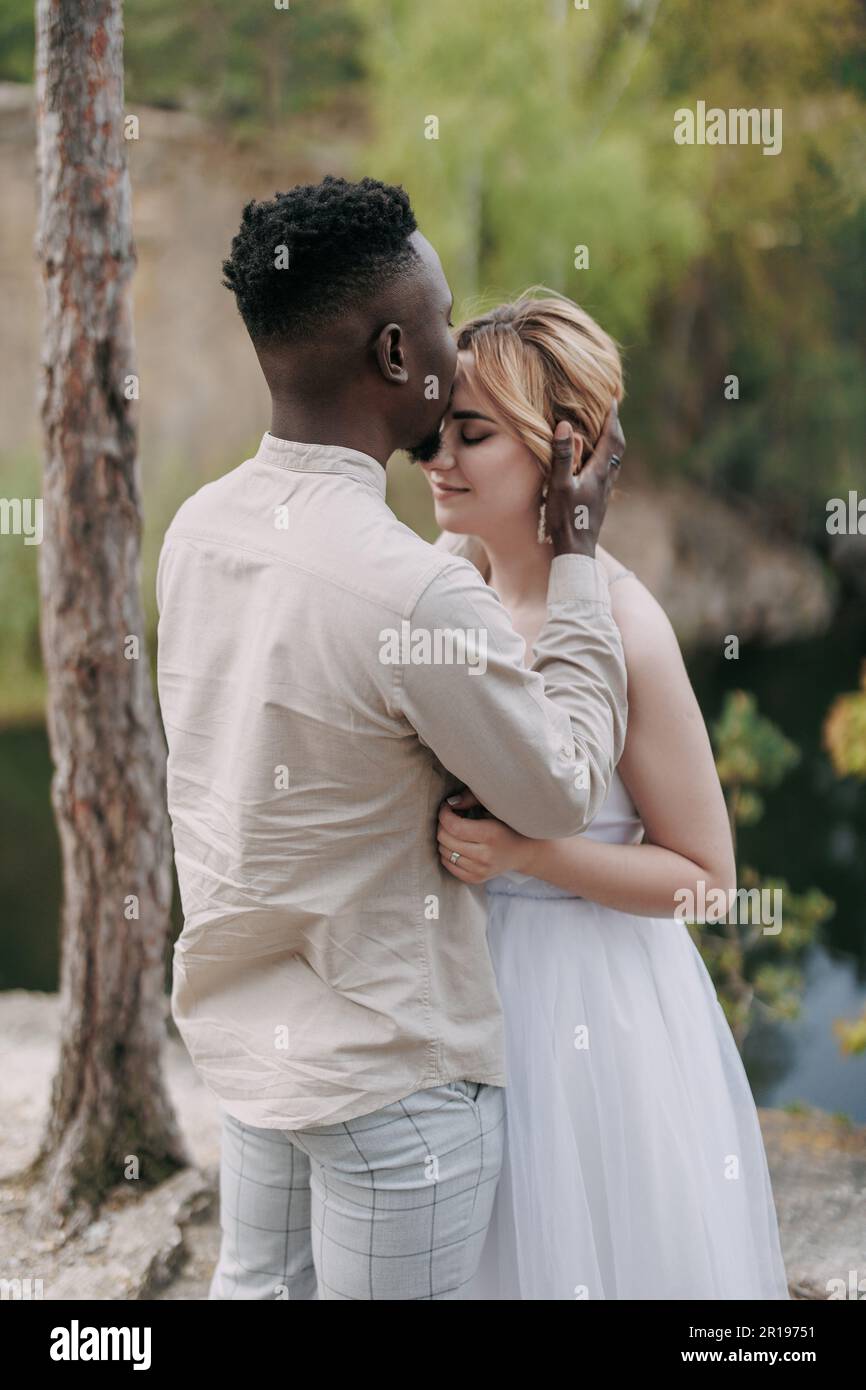 Interracial couple forest hi-res stock photography and images - Alamy