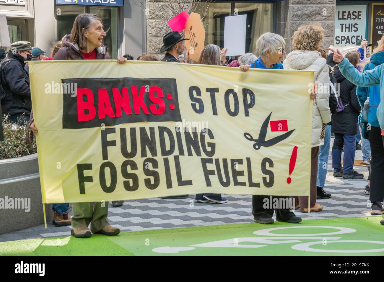 Boston, MA, US-March 21, 2023: Protesters at the National Day of Action to Stop Dirty Banks action sponsored by Bill McKibben's organization Third Act Stock Photo