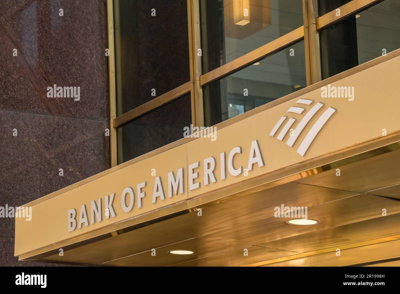 Boston, MA, US-March 21, 2023:  Sign reading Bank of America in modern office building.  Bank of America is a banking and financial services corporati Stock Photo