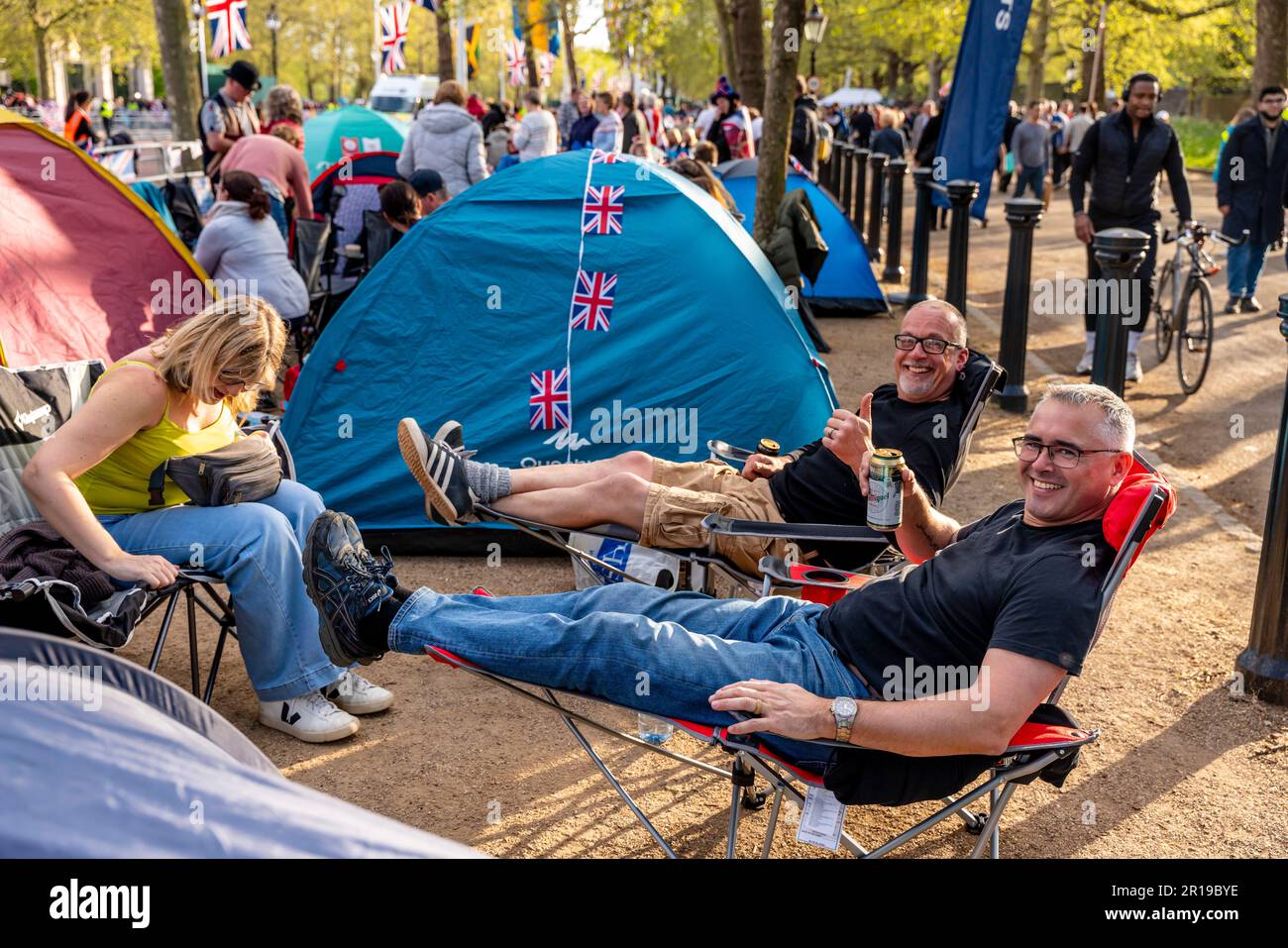 British People Camp Out On The Mall For The Coronation of King Charles III, London, UK. Stock Photo