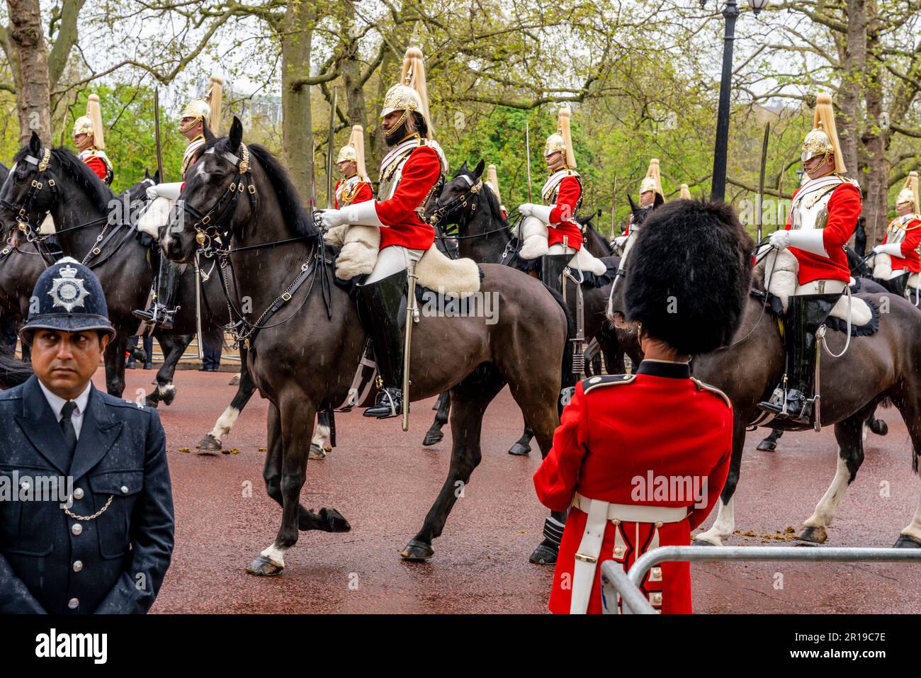 Members of The Household Cavalry Take Part In The King's Procession Along The Mall, The Coronation of King Charles III, London, UK. Stock Photo