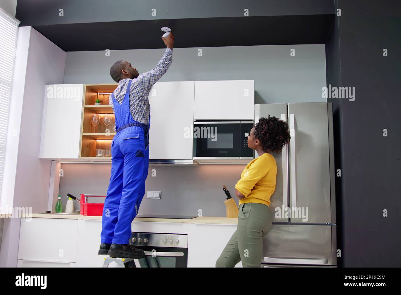 Smoke Fire Alarm Detector Install. Carbon Monoxide Security Stock Photo
