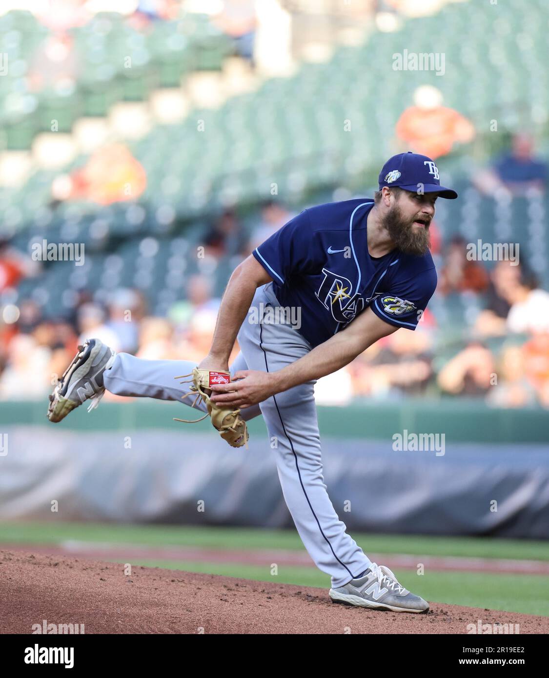 ST. PETERSBURG, FL - APR 10: Jalen Beeks (68) of the Rays delivers a pitch  to the plate during the MLB regular season game between the Baltimore  Orioles and the Tampa Bay