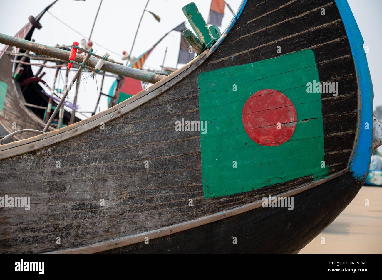 Unique moon shaped fishing boat only found at Cox's Bazar in Bangladesh - home of the world's longest sand beach. Stock Photo