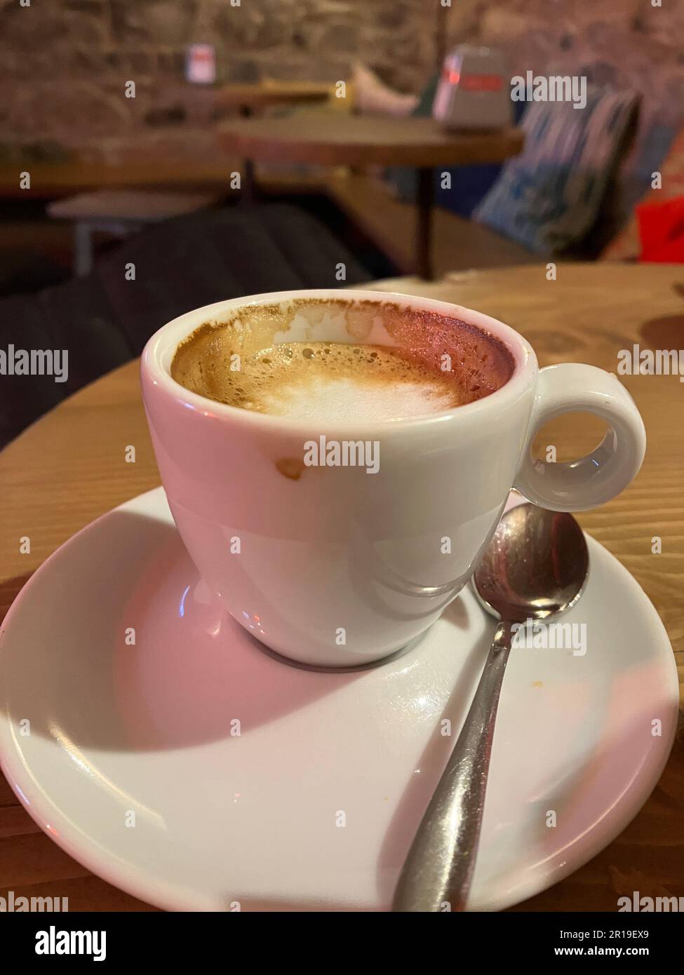 Coffee on Saucer with Spoon Stock Photo