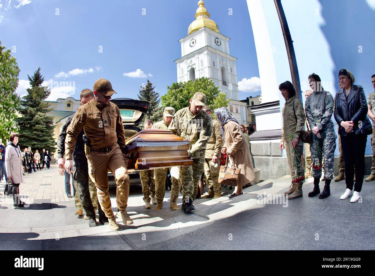 KYIV, UKRAINE - MAY 12, 2023 - Servicemen carry the coffin with the ...
