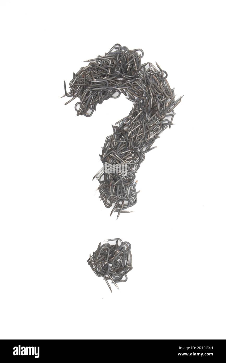 artistic isolated punctuation question mark made from steel staples isolated on a white background write, font, type style, barbed wire staple Stock Photo