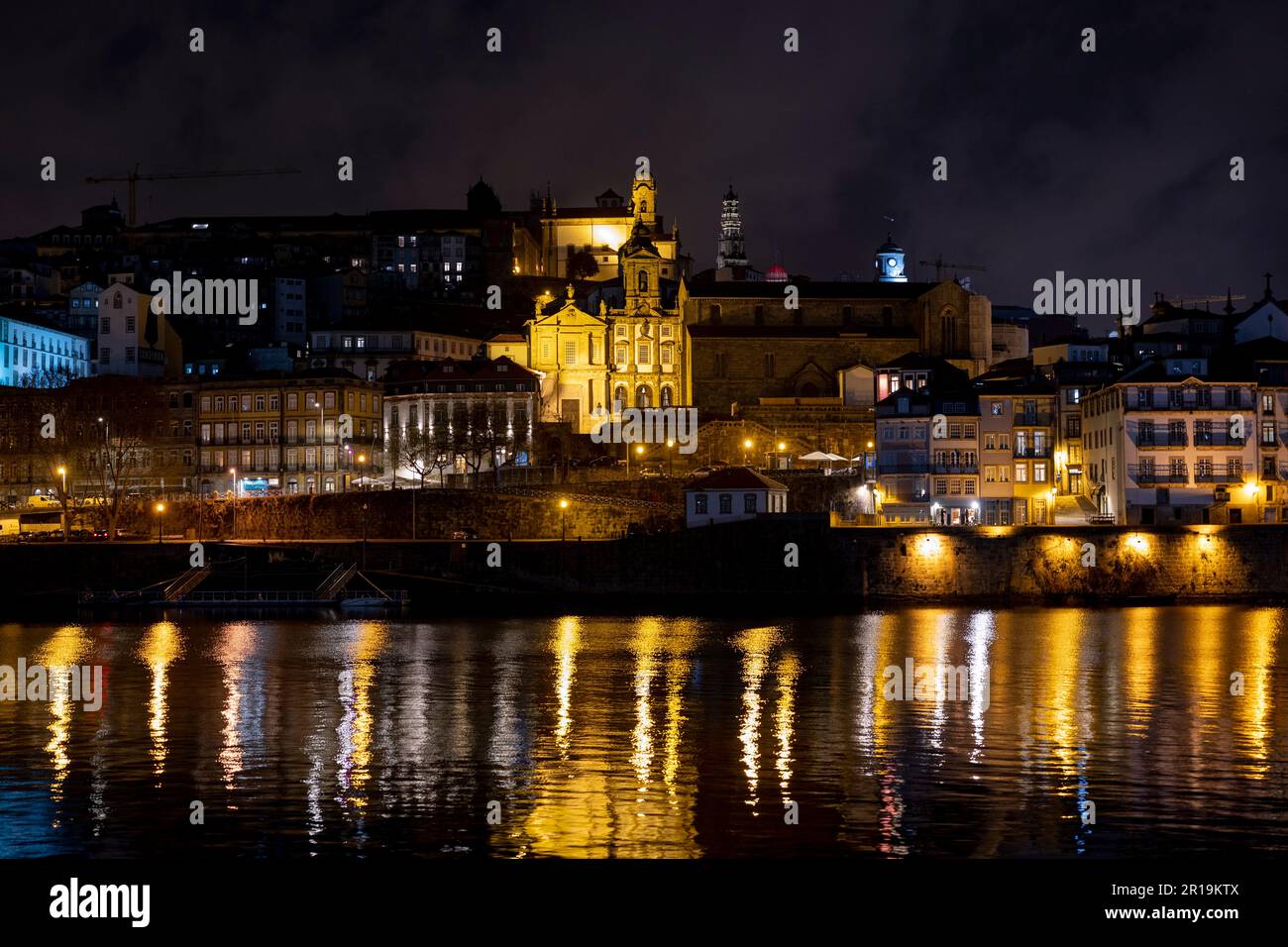 Porto, Portugal - 31.03.2023: Night view of the Douro river and the old town of Porto. Stock Photo