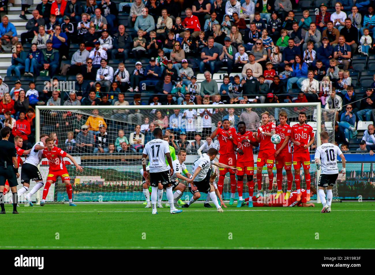 Skien, Norway, 12th May, 2023.  Odd's Espen Ruud fires a free kick but hits the wall. Credit: Frode Arnesen/Alamy Live News Stock Photo
