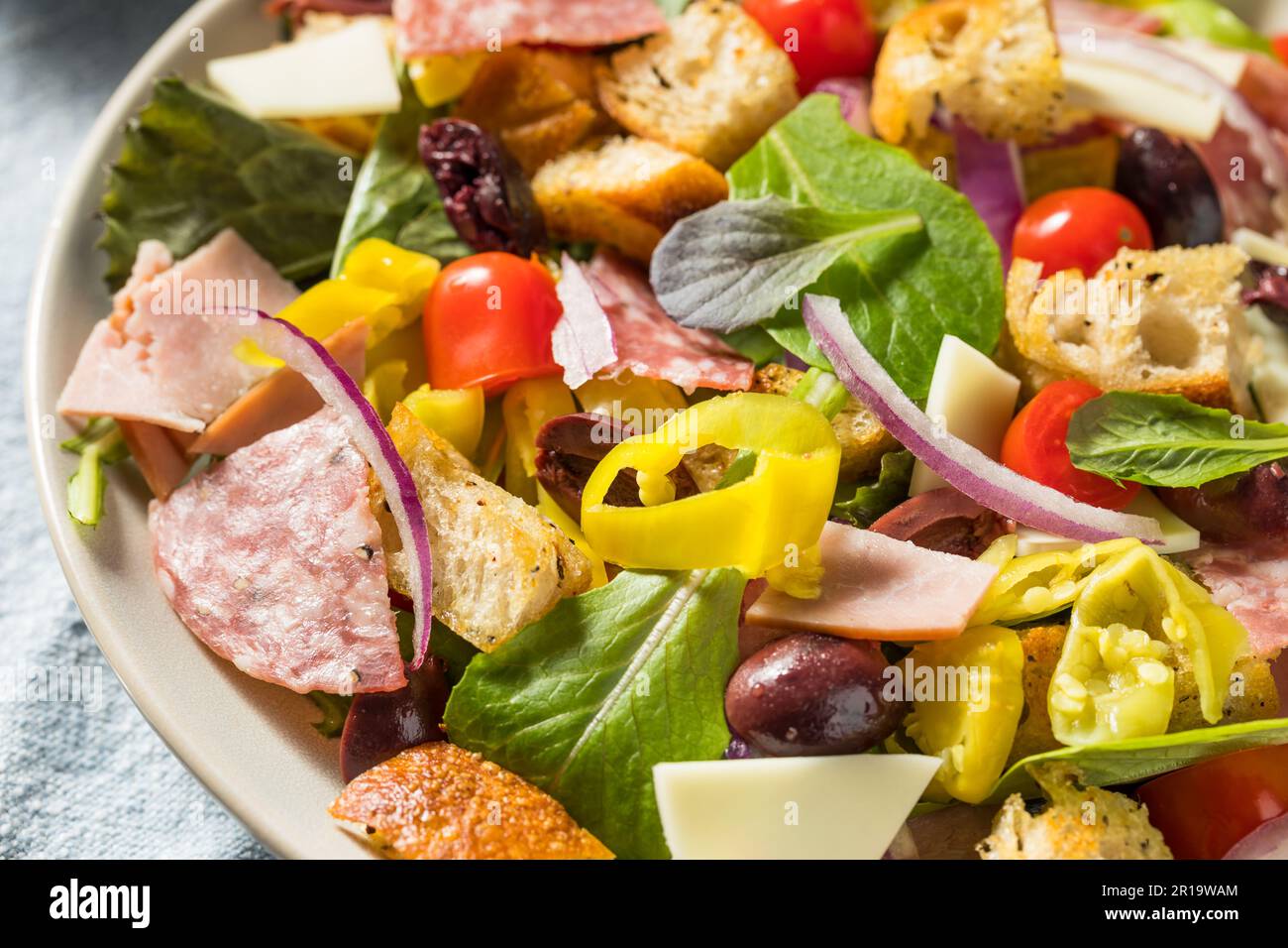 Homemade Italian Sub Salad with Salami Peppers Tomato and Onion Stock