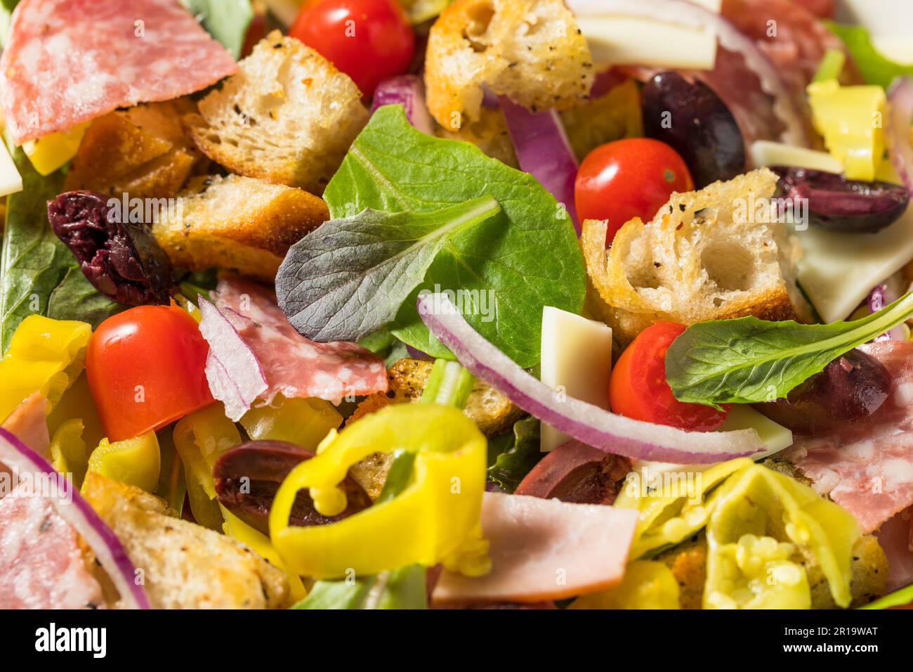 Homemade Italian Sub Salad with Salami Peppers Tomato and Onion Stock