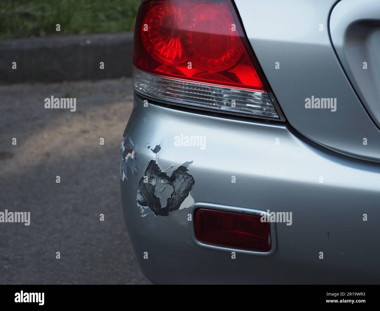Backside of car get scratched, damaged by accident on parking