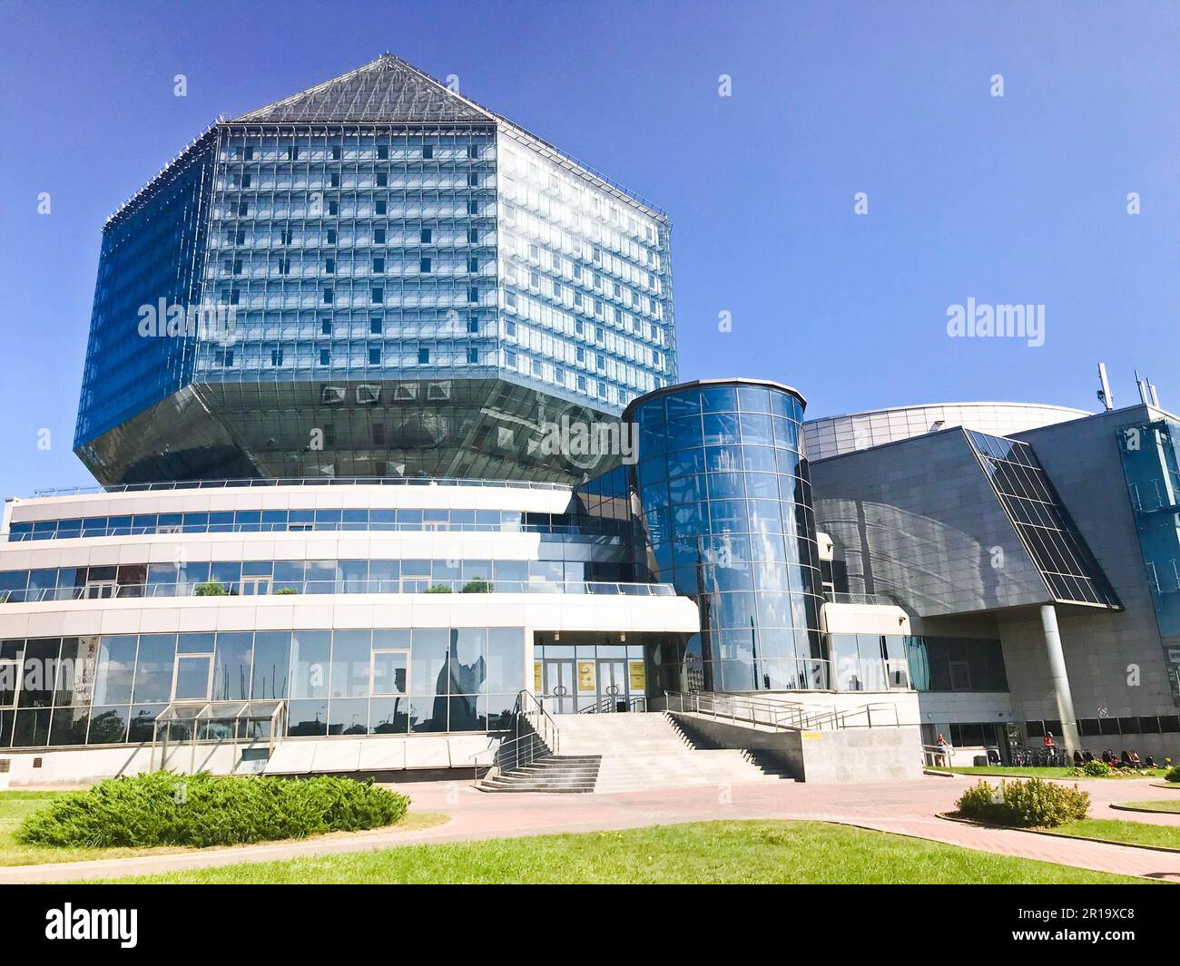 A large blue conceptual beautiful glass building in the shape of a diamond in a modern state-owned national library of Belarus. Republic of Belarus, M Stock Photo