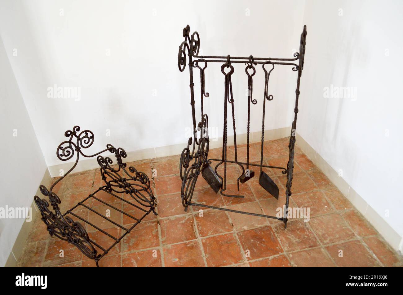 Iron black metal wrought iron accessories for the fireplace, poker