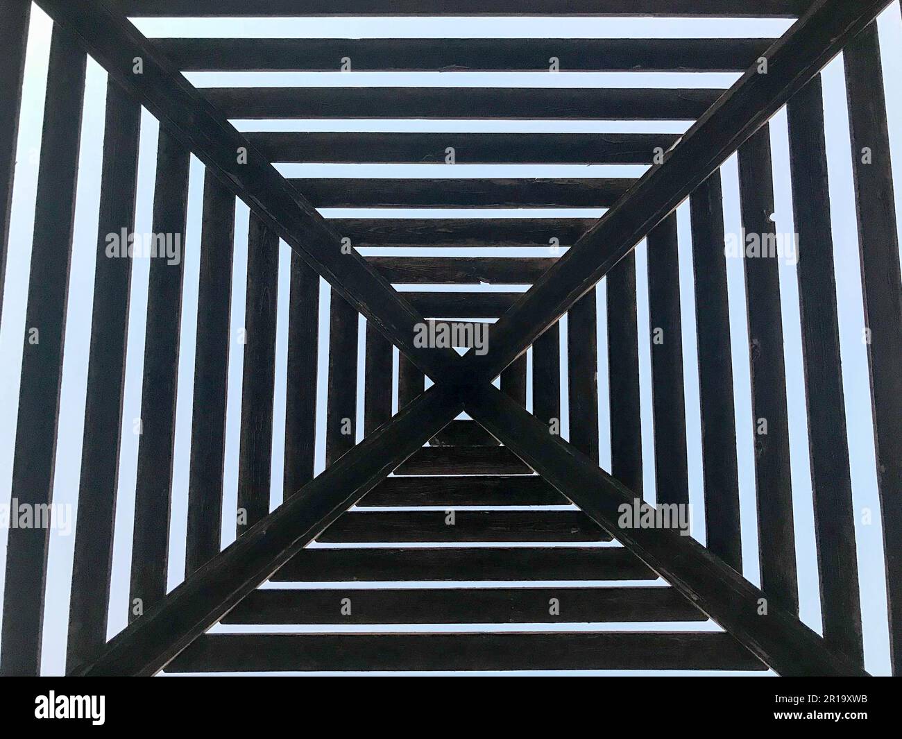 Texture abstract triangular dark brown wooden logs of logs, planks ...