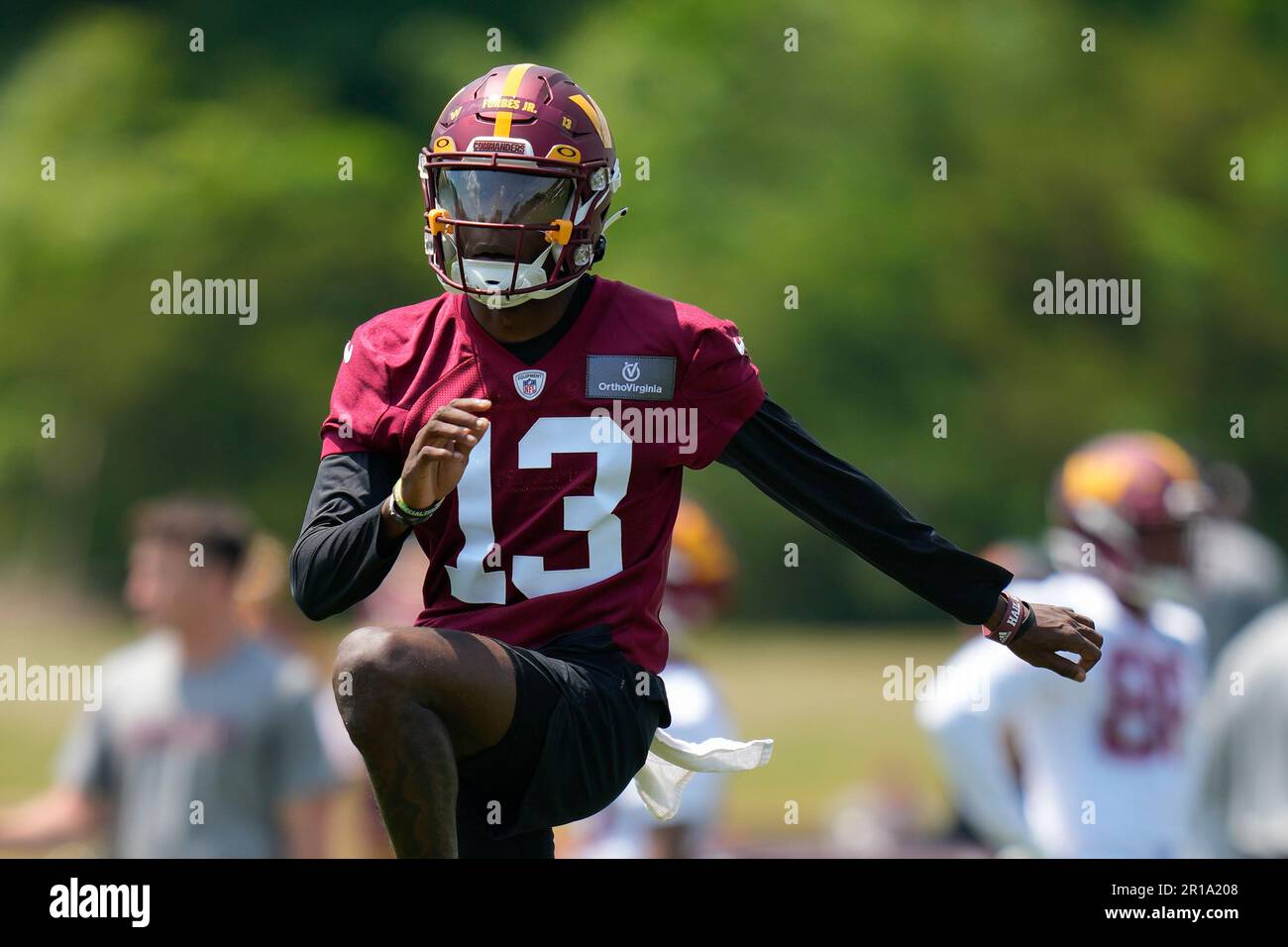 Washington Commanders cornerback Emmanuel Forbes Jr., runs a drill