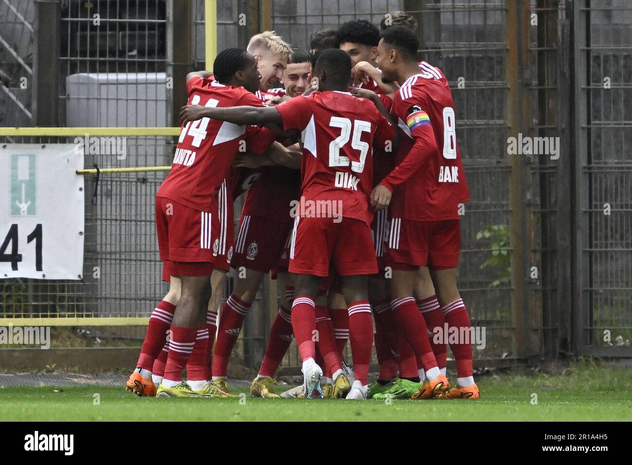 Lommel, Belgium. 12th May, 2023. SL16's players celebrate after scoring during a soccer match