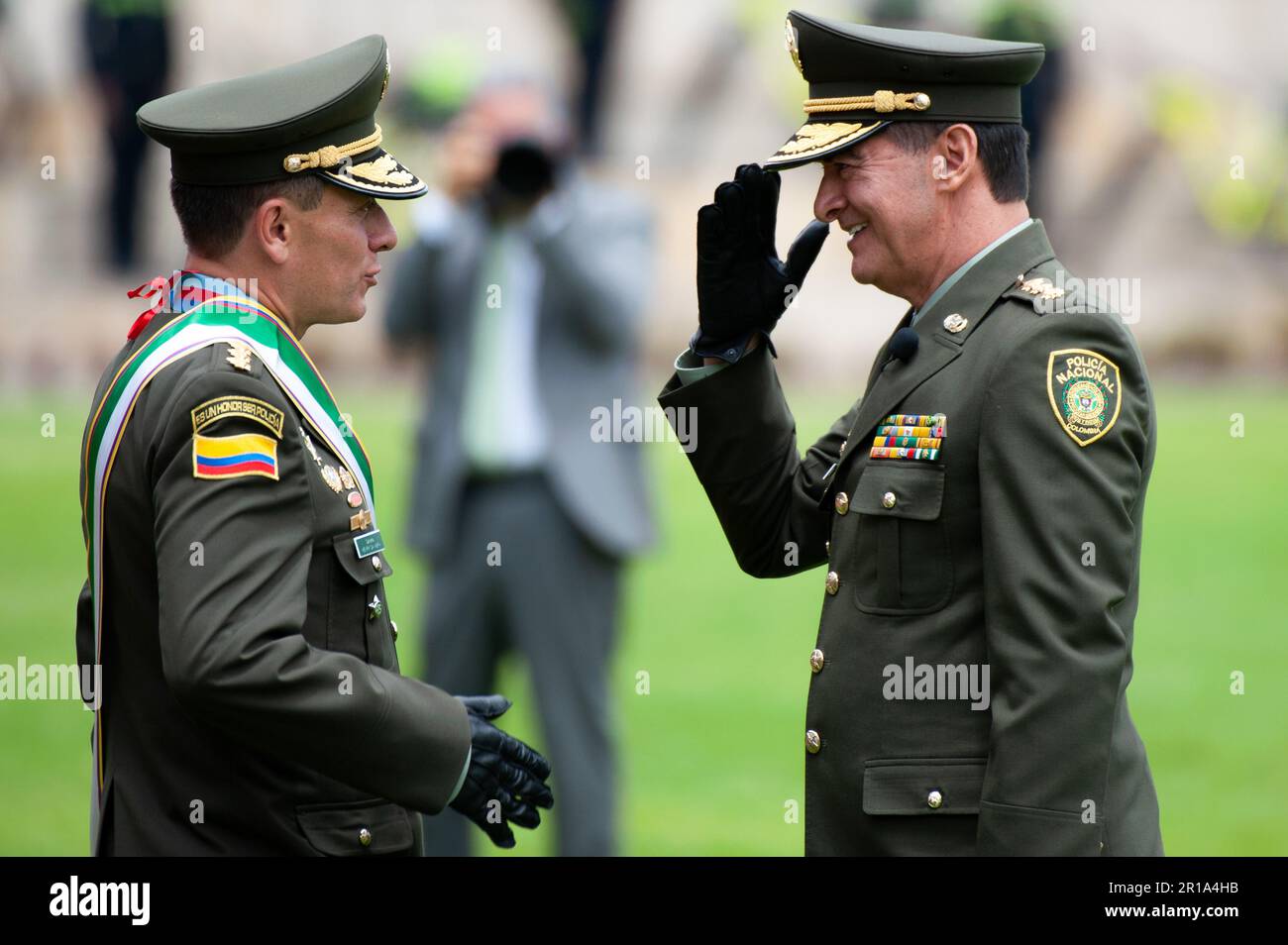 Colombia's new police director mayor General William Rene Salamanca, salutes the outgoing general Henry Sanabria during the ceremony of the new Colomb Stock Photo