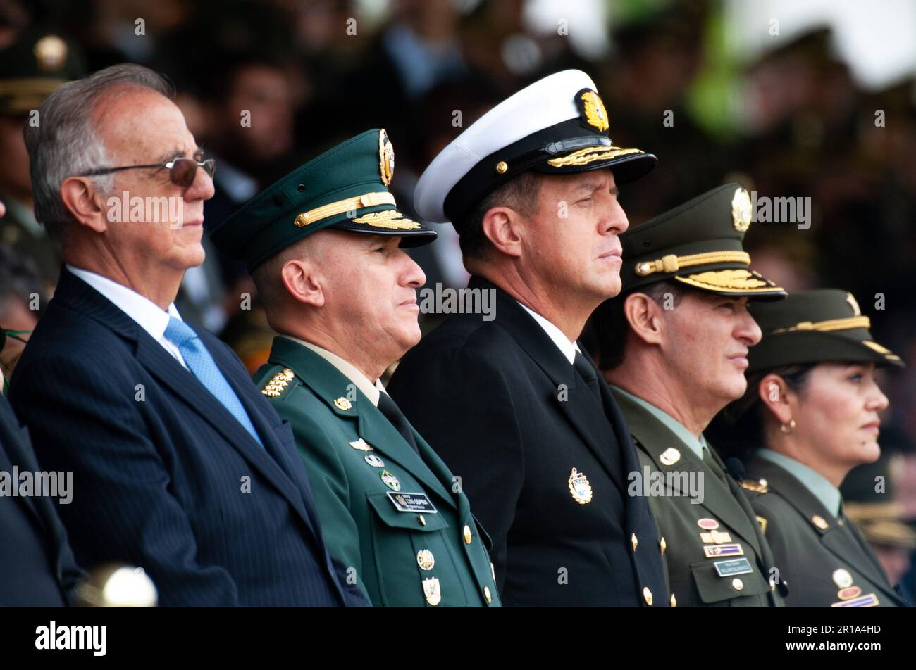 Colombia's minister of defense Ivan Velasquez followed by joint chief of staff members General Luis Ospina, Admiral Francisco Cubides and the new poli Stock Photo