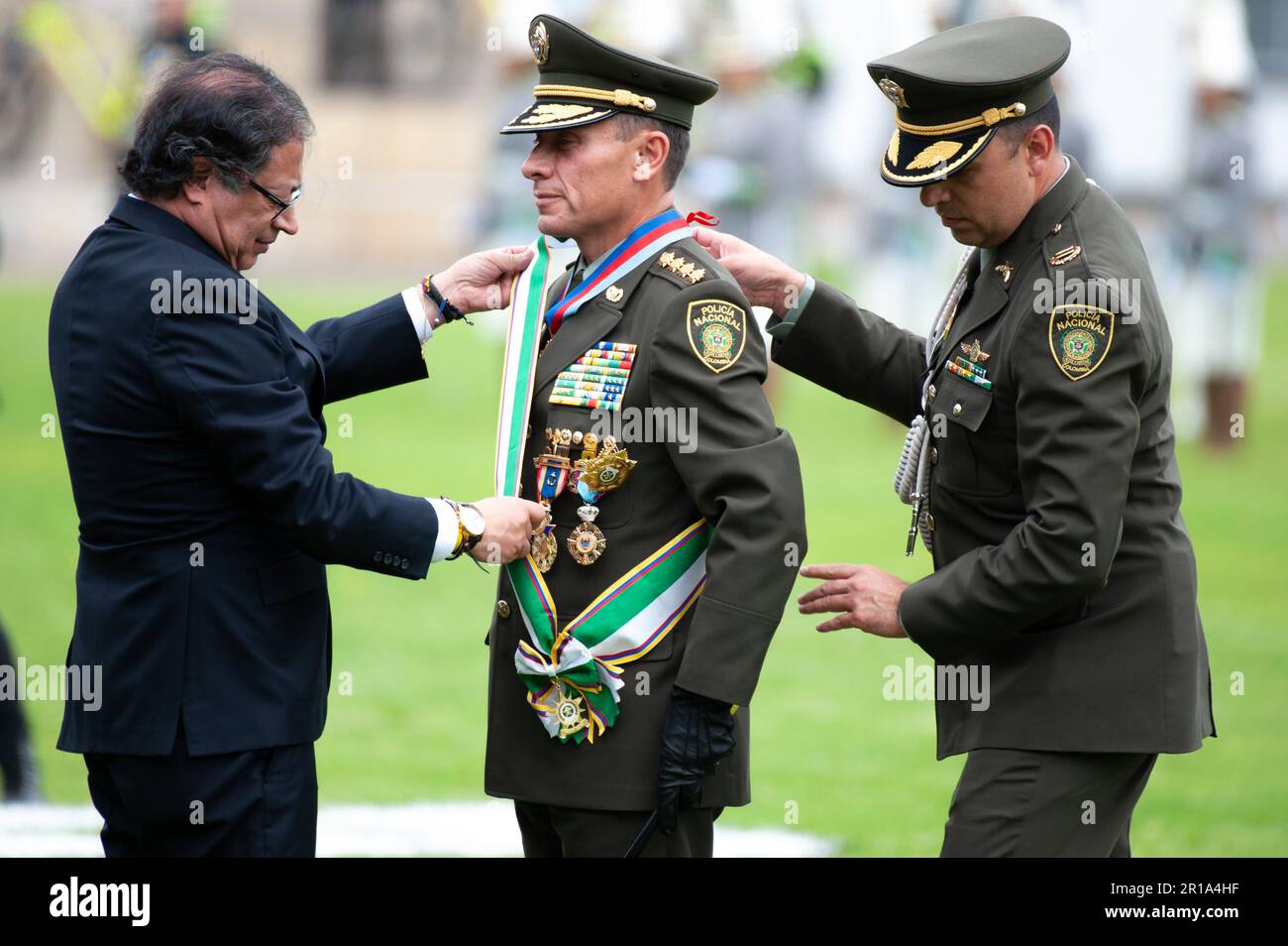 Colombia's outgoing police director Henry Sanabria receives condecorations from Colombian president Gustavo Petro during the ceremony of the new Colom Stock Photo