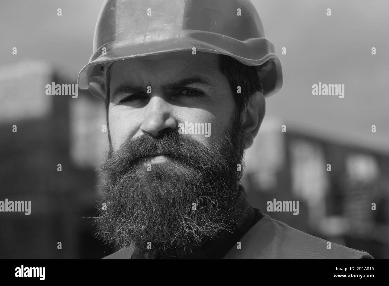 Construction worker in uniform and safety equipment have job on