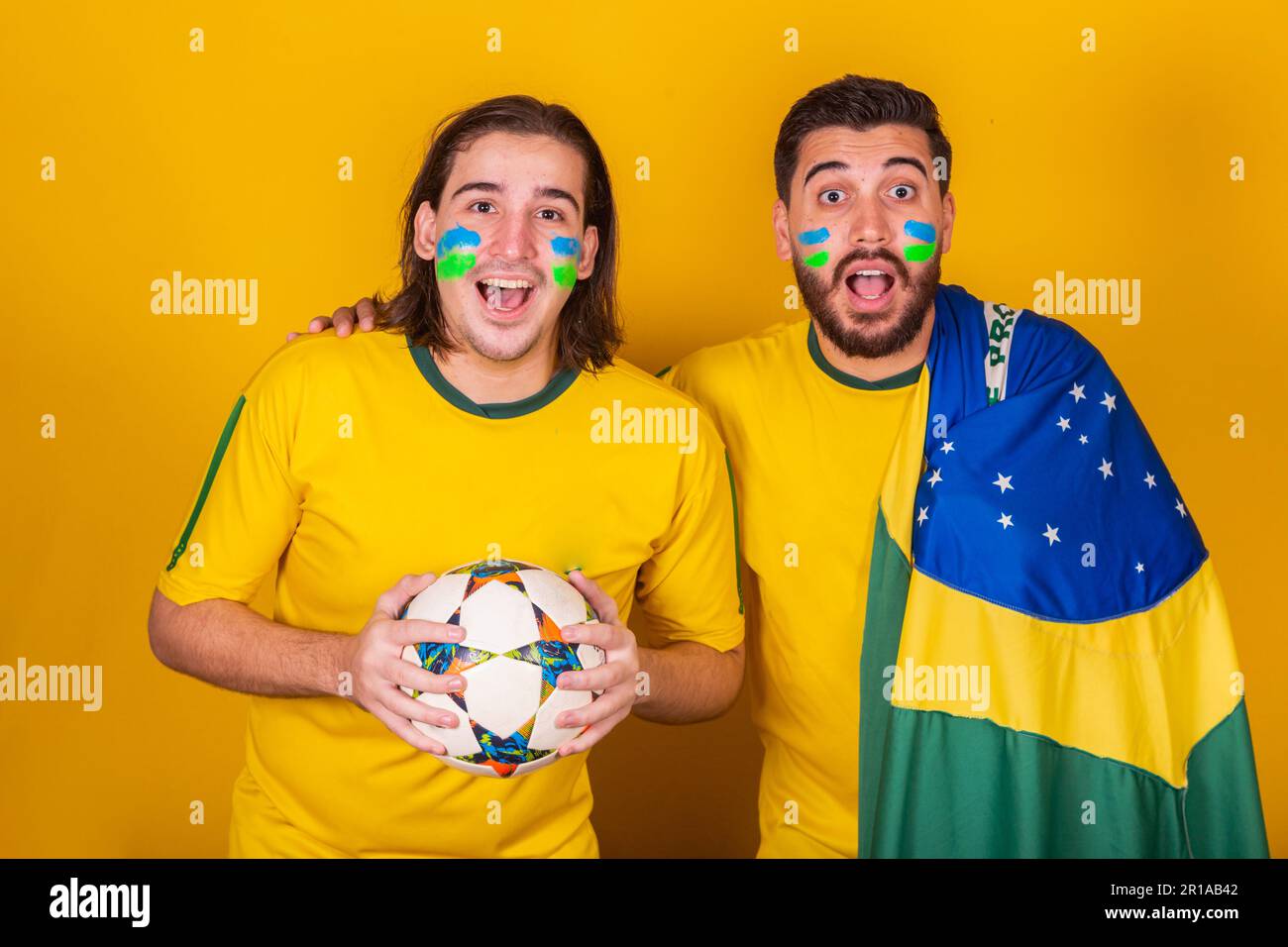 Brazilian friends, Latin Americans, diversity, cheering for Brazil, in the 2022 world cup, Amazed, surprised Stock Photo