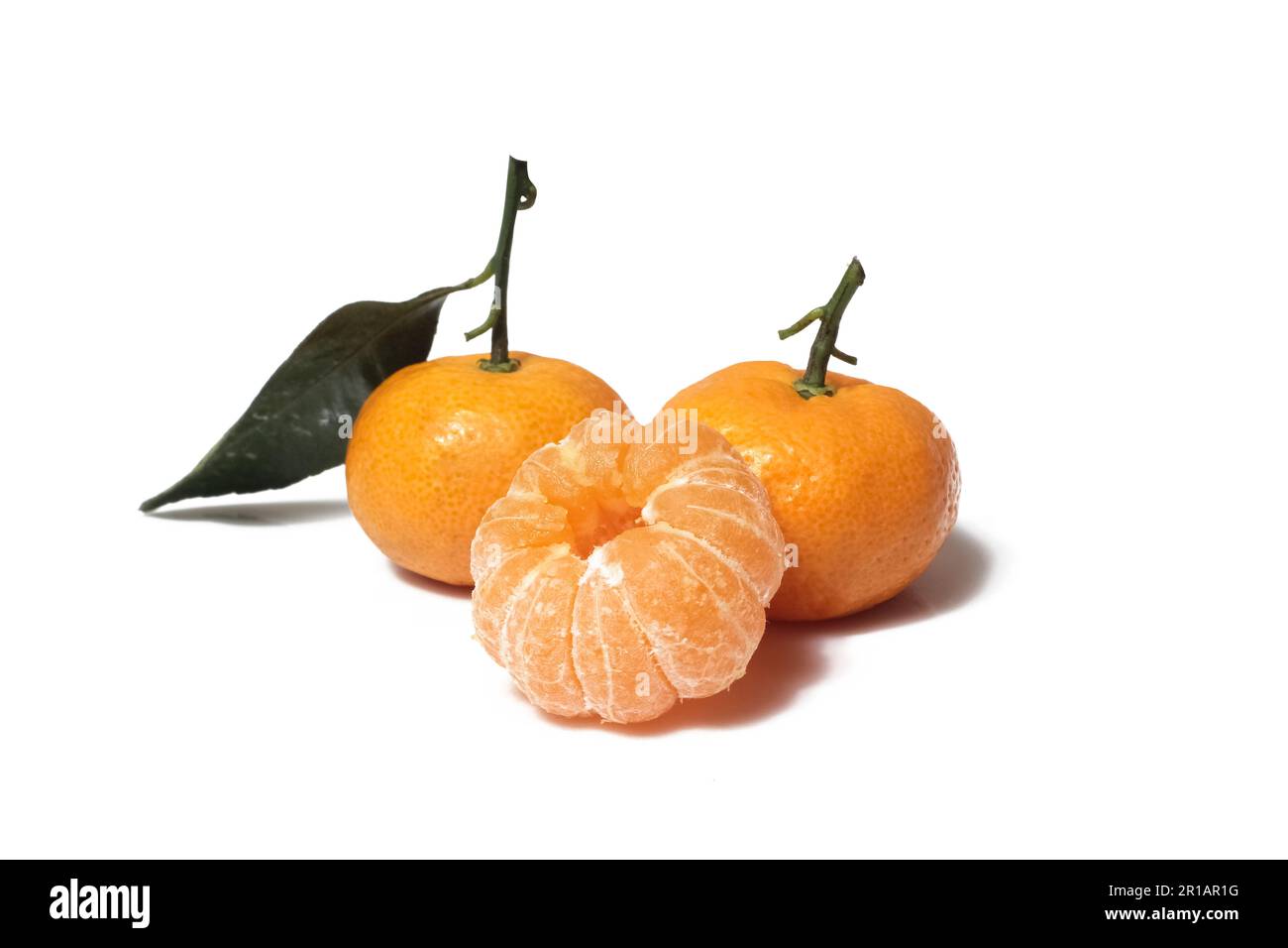 Orange fruit with leaf isolated on white background. Stock Photo