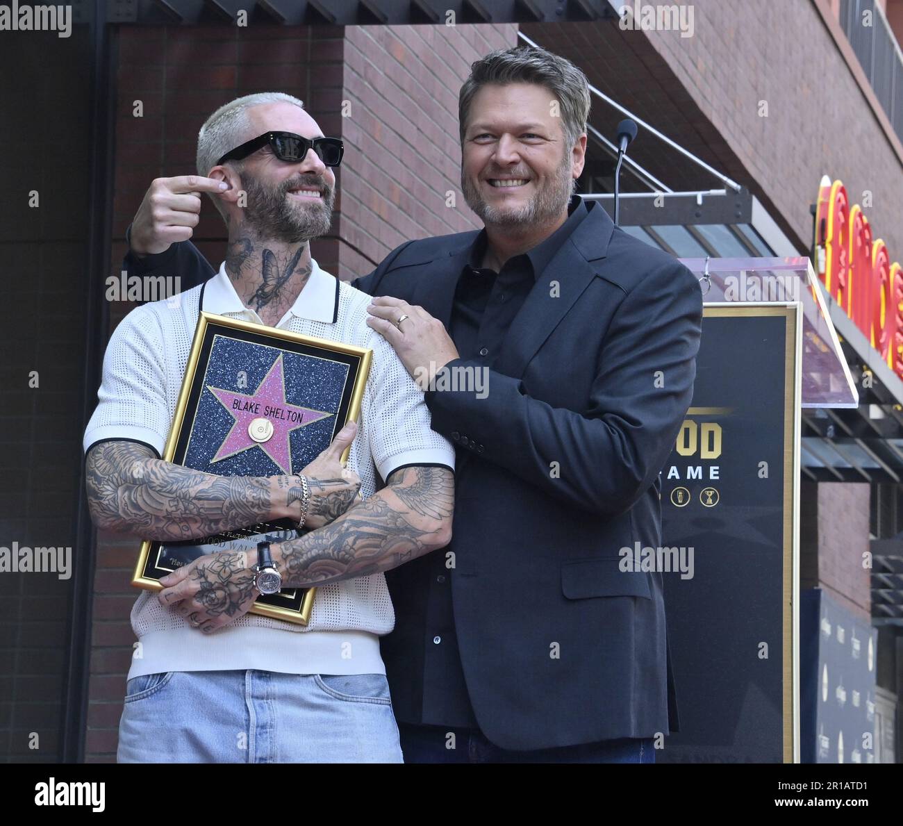 Los Angeles, United States. 12th May, 2023. Singer and entertainer Blake  Shelton is joined by singer Adam Levine during an unveiling ceremony  honoring him with the 2,755th star on the Hollywood Walk