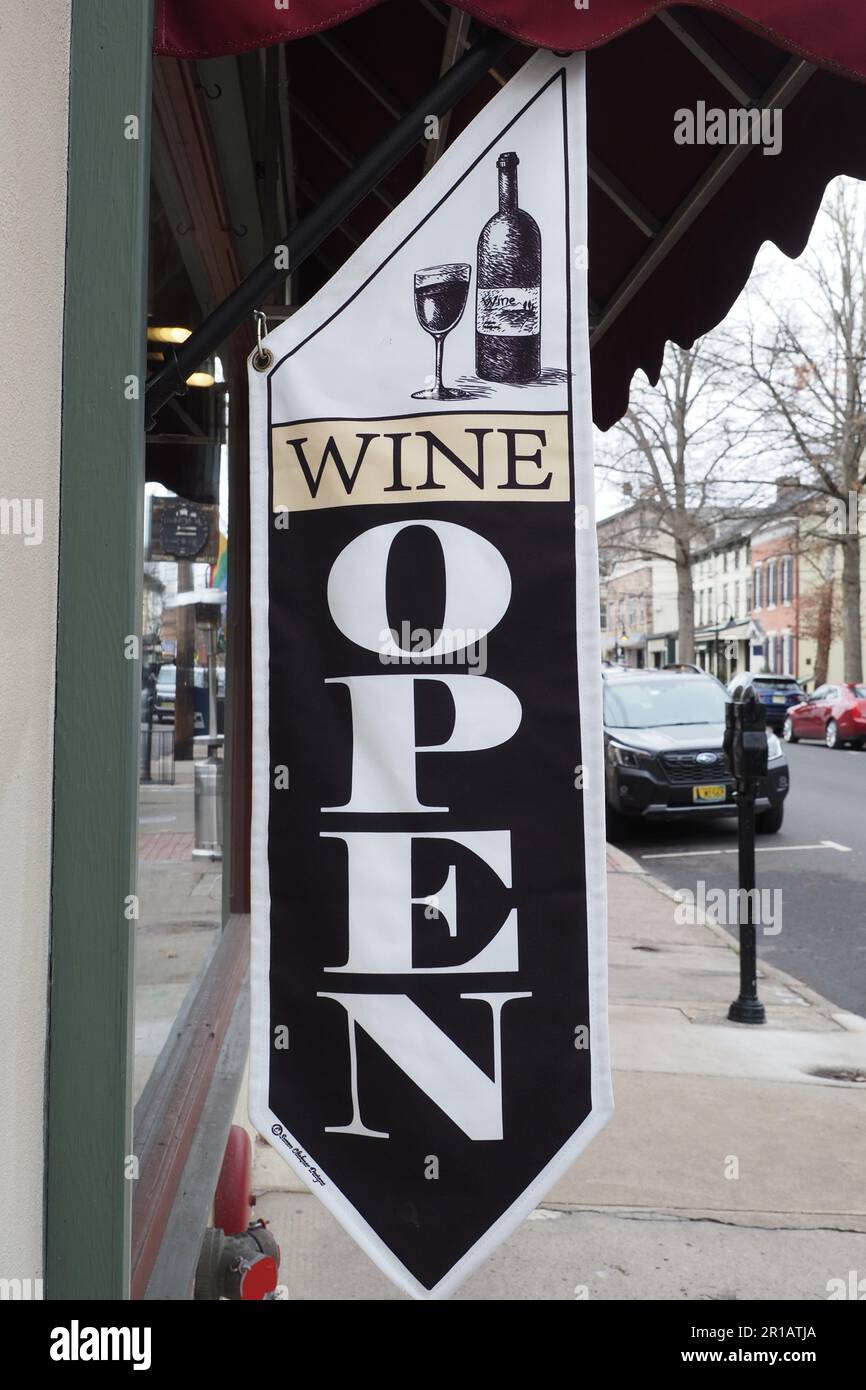 The wine store has a unique sign in front of the store Stock Photo - Alamy