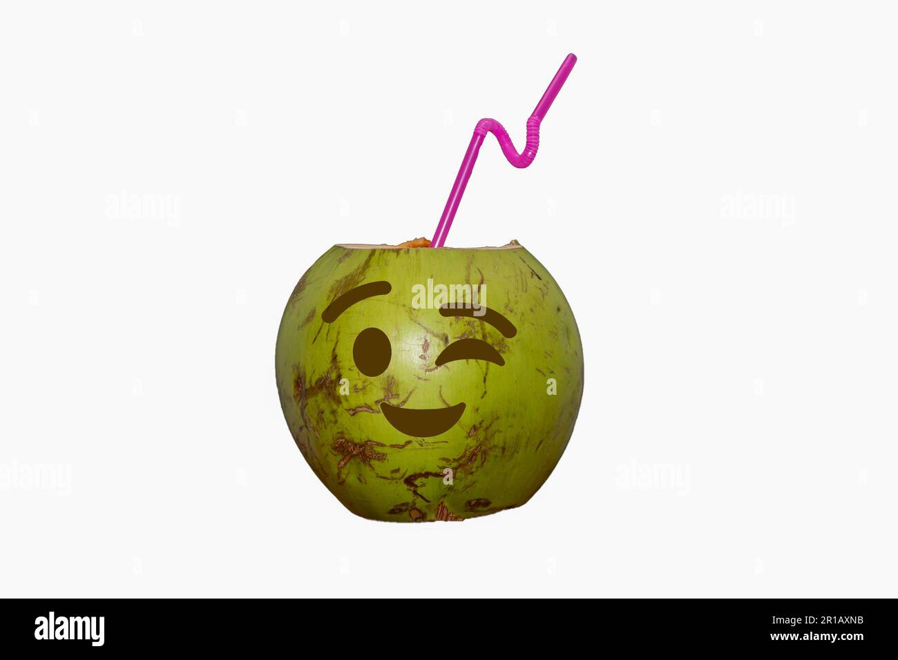 Green coconut with drawn emoji. tropical coconut water in selective