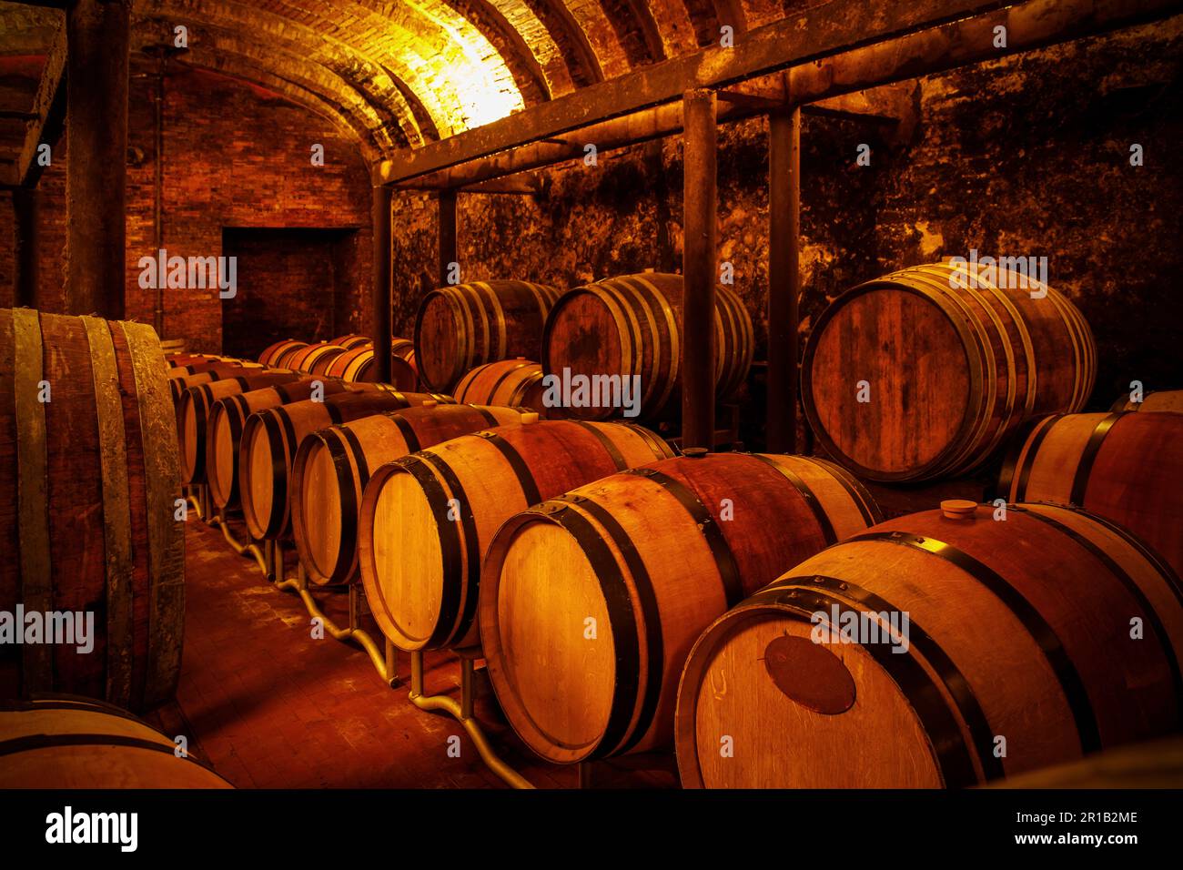 Rustic wine storage room with wooden barrels Stock Photo Alamy