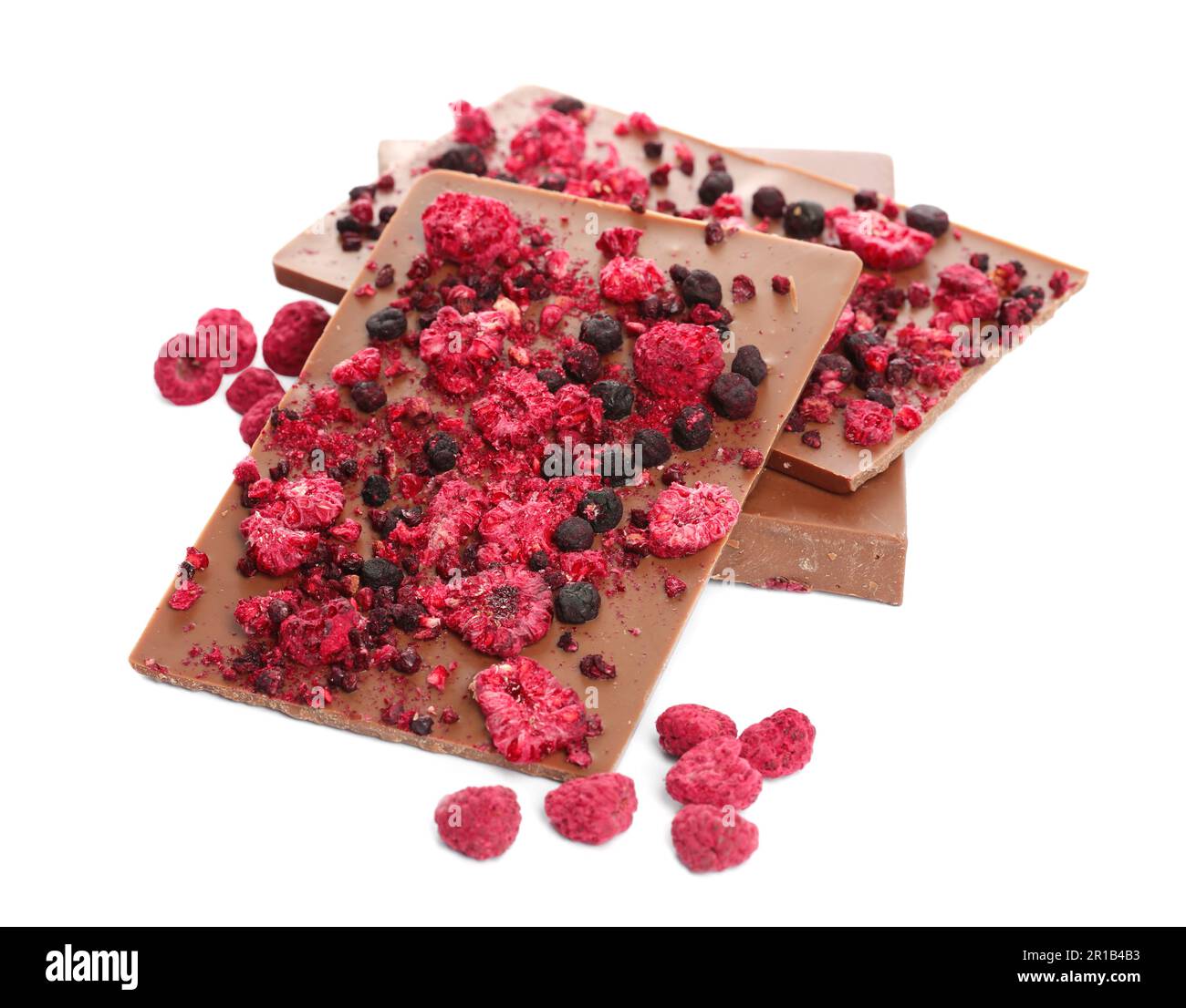 Chocolate bars with freeze dried berries on white background Stock ...