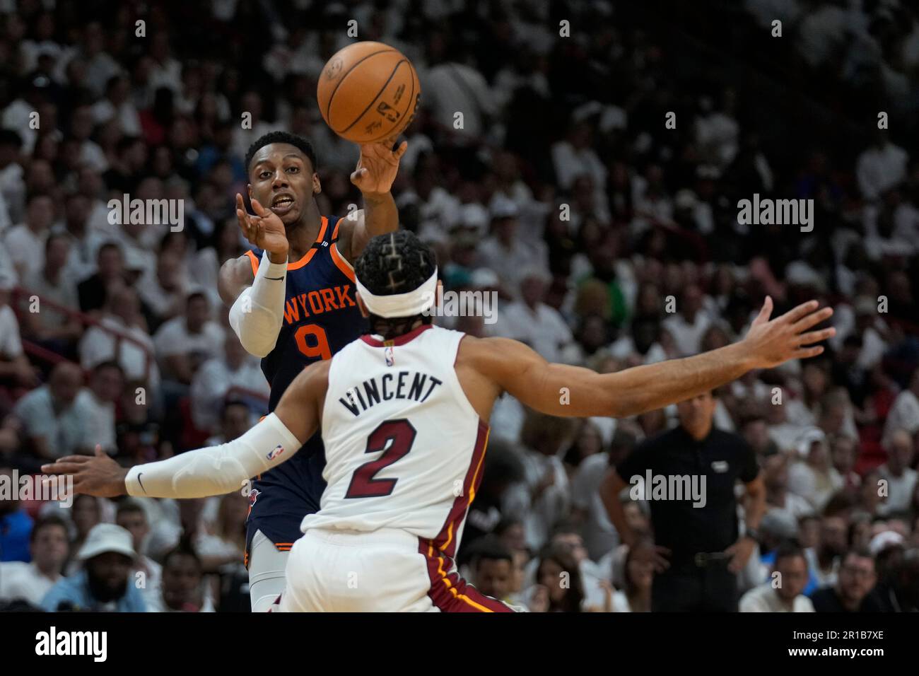 New York Knicks guard RJ Barrett (9) passes past Miami Heat guard Gabe