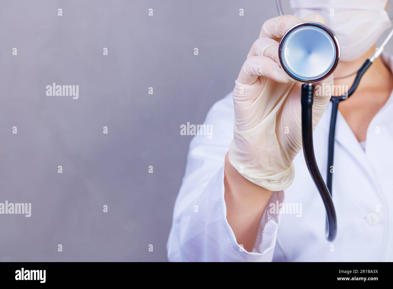 Close-up of female doctor using stethoscope , focus on stethoscope ...